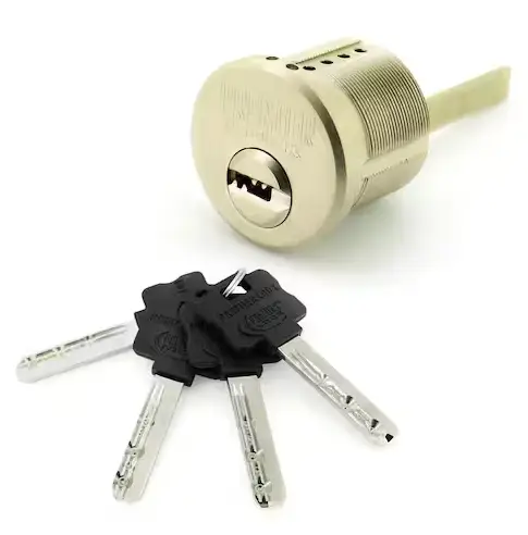 A cylindrical lock with four matching dimple keys featuring black plastic heads, displayed on a white background—an ideal addition to your range of quality locksmith products.